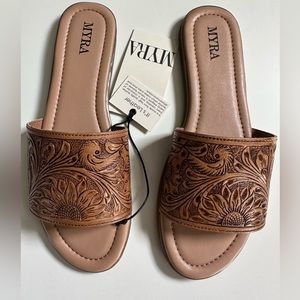 New! Leather tooled sandals.